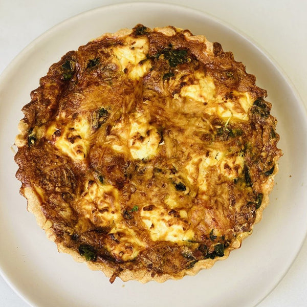 Whole quiche with asparagus, haloumi