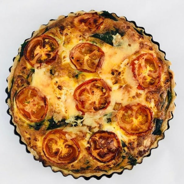 Whole quiche with asparagus, haloumi